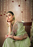 Ethereal Pistachio Green Tissue Dola Silk Saree