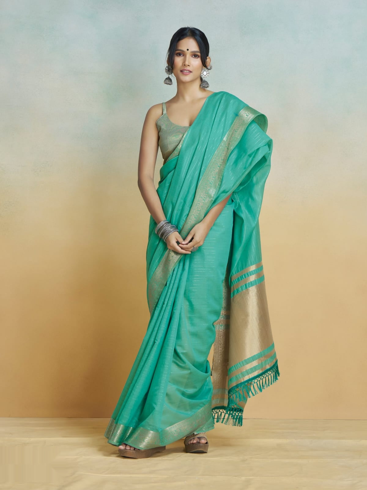 Khadi Silk Saree with Golden Zari Border – Teal Green