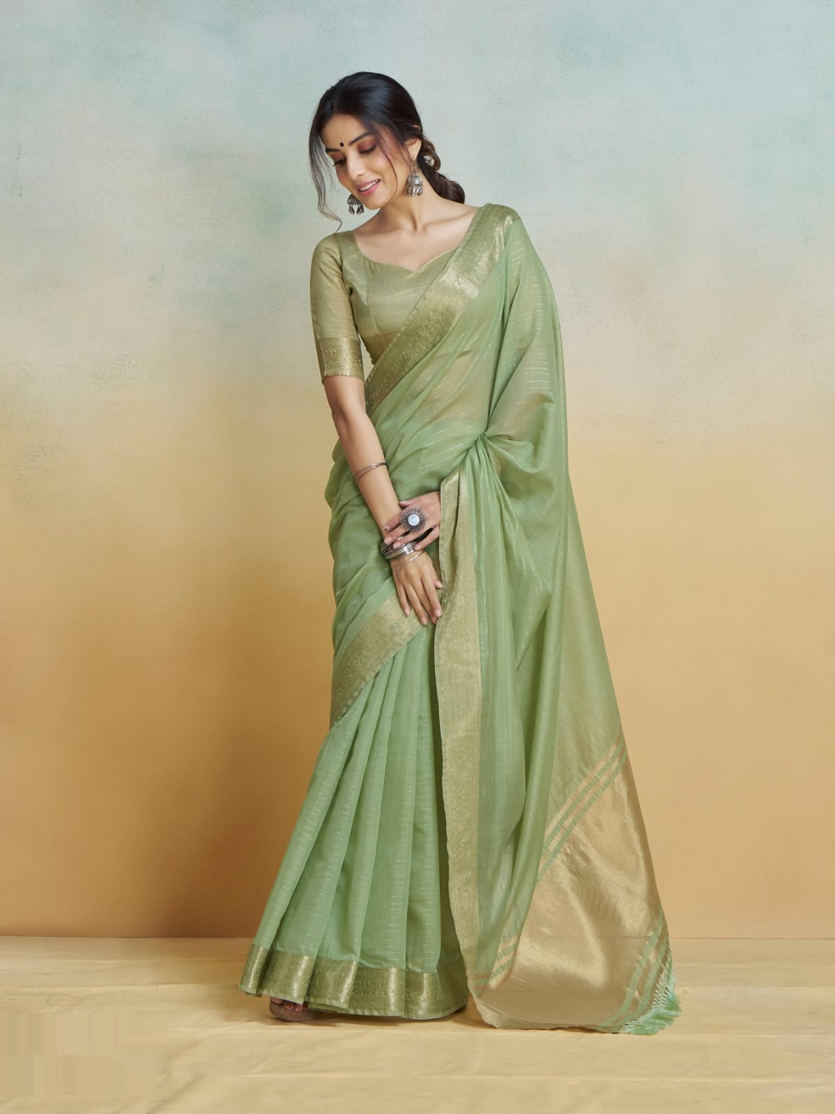 Green Khadi Silk Saree with Golden Zari Border & Tassel Pallu