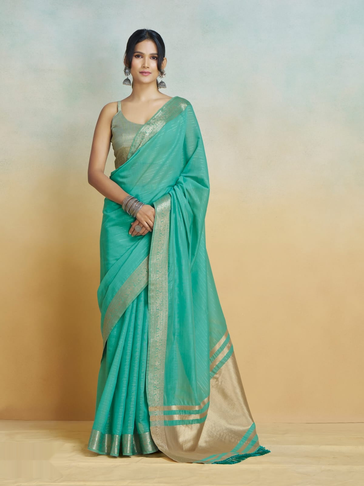 Khadi Silk Saree with Golden Zari Border – Teal Green